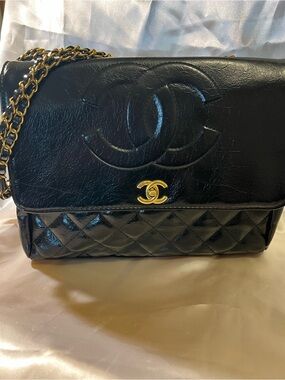 Black Quilted Lambskin Shoulder Bag with Gold Hardware. New